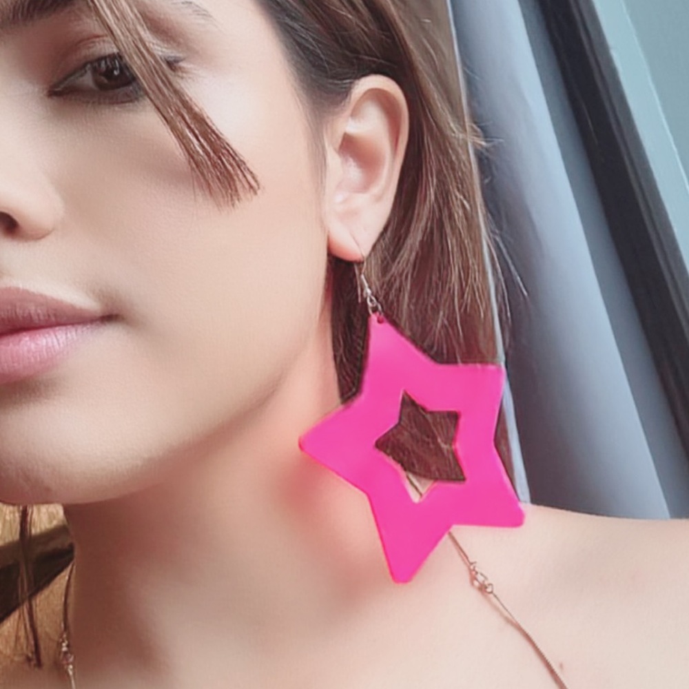 Big pink star earrings